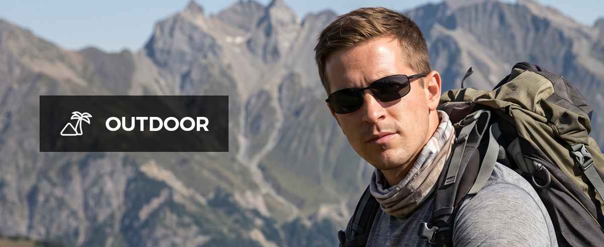 man wearing carbon fiber polarized sunglasses cycling outdoors